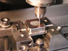 Utilizing a CBN super abrasive on a carbide mandrel for rigidity cuts grind time in half
